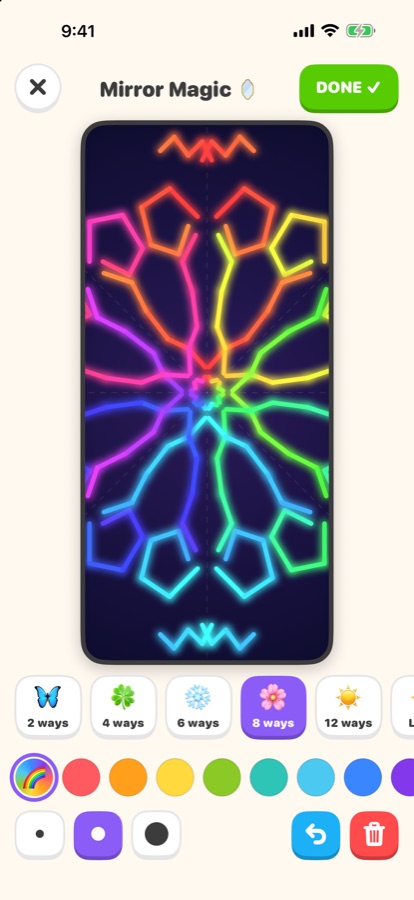 A glowing rainbow kaleidoscope made in Mirror Magic